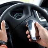 Texting with your voice while driving as dangerous as the old-fashioned way, study shows