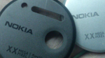 More Nokia EOS metal lens cap pictures leak, one in black and the other in white