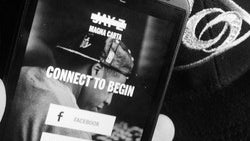 Jay-Z Magna Carta Holy Grail album app seen running on HTC smartphone