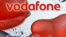 Vodafone and Telefónica shake hands