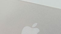 Mockups of the Apple iPhone 5C and Apple iPhone 5S are photographed with the Apple iPhone 5