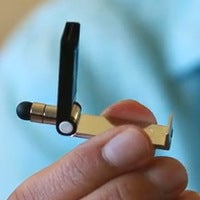 Accessory combines capacitive stylus, USB thumb drive, smartphone stand into one