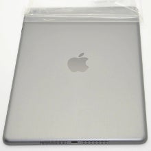 New space gray Apple iPad 5 tablet pictured from all angles, stacked with the silver iPad 5