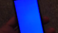Watch as an Apple iPhone shows the "Blue Screen of Death"