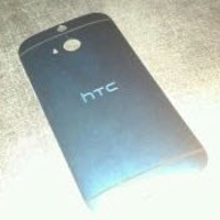 Pictures of the HTC M8's back cover leak, reveal mysterious new element