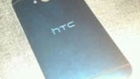 Pictures of the HTC M8's back cover leak, reveal mysterious new element