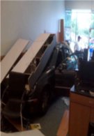 Woman plows her car into a store for a Pre