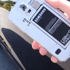 Samsung Galaxy S5 survives after being run over by a Tesla Model S