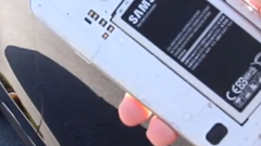 Samsung Galaxy S5 survives after being run over by a Tesla Model S