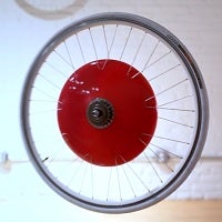 The Copenhagen Wheel connects your bicycle to your smartphone, and gives you a real boost