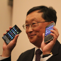 BlackBerry CEO John Chen shows off the BlackBerry Passport and BlackBerry Classic