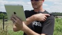 Apple iPad used in trick shot where bullet is fired at a machete, splitting it in half
