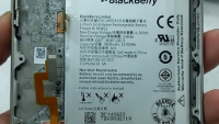 Watch the BlackBerry Passport get torn down with screwdrivers and a tweezer
