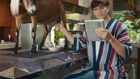 Ashton Kutcher is milking a goat in the first video ads for Lenovo's new tablets
