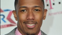Nick Cannon uses his iPhone to tweet an ad for the T-Mobile Samsung Galaxy S6