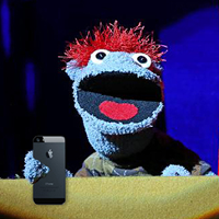 Audience member climbs onto a Broadway set to charge his phone just before the opening curtain