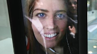 Robot waits in line for the new iPhone as Sydney kicks off sales of the newest models
