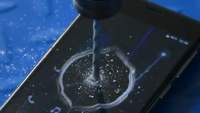 Watch the Oukitel K4000 get drilled; will the device work with a hole in the middle of the screen?
