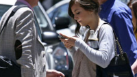 Smartphones are distracting both drivers and pedestrians