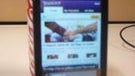 Pictures of the Sony Ericsson Kurara and a Coca-Cola can