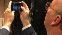 Alphabet executive chairman Eric Schmidt caught using an Apple iPhone