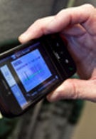 Mobile phones are the must have accessory for saving money this holiday shopping season