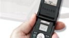 French President receiving a new encrypted phone after a BlackBerry ban