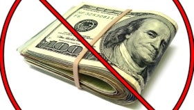 Qualcomm lowers its profit forecast, as Apple won't pay royalties