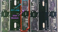 iPhone 7s Plus bare logic board poses for the camera, A11 chip and