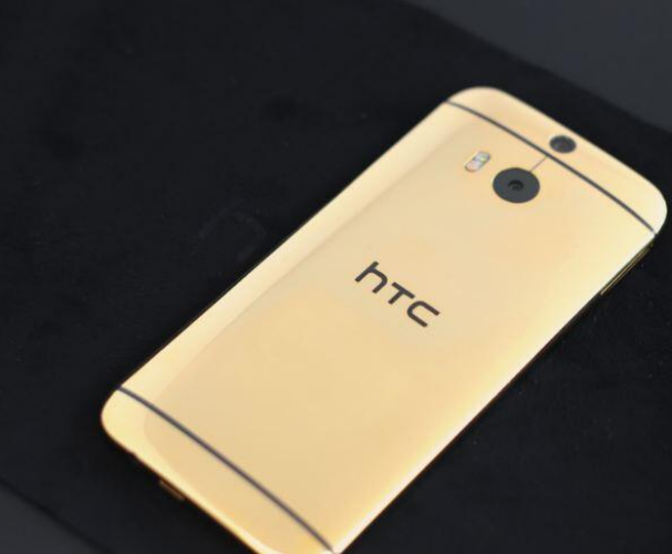 John Legere's new HTC One (M8), finished in 24K Gold and a free gift from HTC America - Wish you were John Legere? CEO receives HTC One (M8) with 24K Gold finish as a gift from HTC