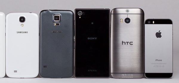 The Galaxy S5 (2nd from the left) is made out of plastic, the Xperia Z1 (3rd) - of glass, and the HTC One M8 (4th) - of metal - What's your favorite material for a phone/tablet?