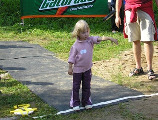 A phone throwing athlete in Junior category - Did you know: the Mobile Phone Throwing World Championships is an annual event; world record stands at over 300 feet