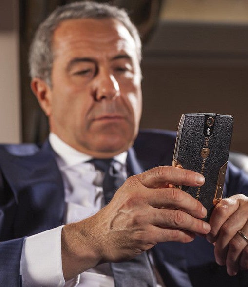 An elegant gentleman enjoying Android 4.4.4 KitKat on the $6,000 handset - Here is the Tonino Lamborghini 88 Tauri - steel and leather aplenty, a four-digit price tag as well