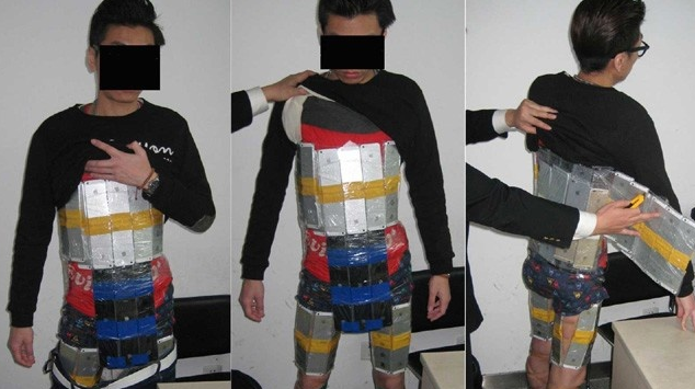 Smuggler nabbed with 94 iPhones strapped to his body - Smuggler caught in China with 94 Apple iPhones strapped to his body