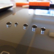 Water drops on oleophobic coating. Image courtesy of iFixit - Oleophobic coating – what it is, how to clean your phone, what to do if the coating wears off