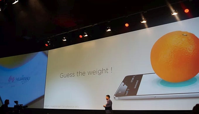 Huawei trolls Apple, weighs an orange to show off the pressure-sensing display on the Mate S