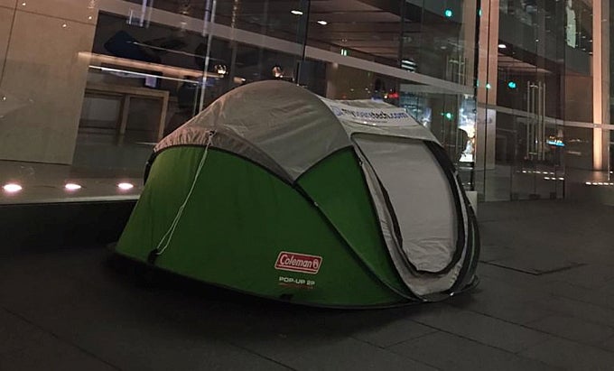 iPhone 6s mania: one eager Apple fan has already set up tent in front of the Apple Store in Sydney