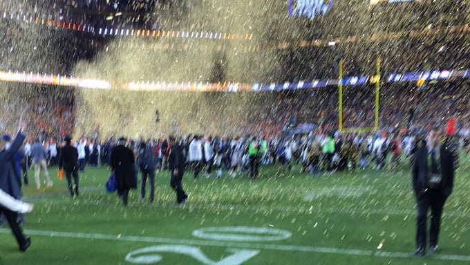 Tim Cook posted this blurry photo from his iPhone right after the Broncos win - Tim Cook posts god-awful blurry photo from his iPhone at Superbowl (UPDATE: takes it down!)