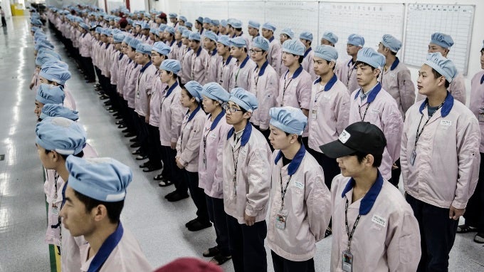 Photo by Quai Shen, Bloomberg. - iPhone assembly workers at Pegatron work less overtime, still feel underpaid