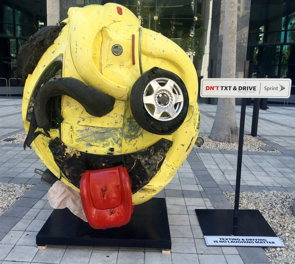 Sprint's new sculpture is supposed to make you think twice about texting and driving - Sprint unveils car crash sculpture in Miami to scare those who text and drive