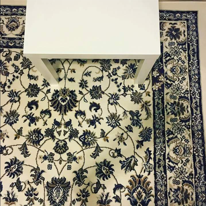 Can you find the iPhone, ensconced in a floral case, lost in the carpet? - Can you spot the Space Gray iPhone that is lost on this carpet?