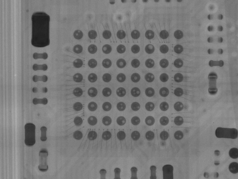 The tiny air bubbles can be seen as white spots on the soldering joints of this X-ray photo of one of the microcontrollers. - AirPods Teardown: Impossible to repair or recycle