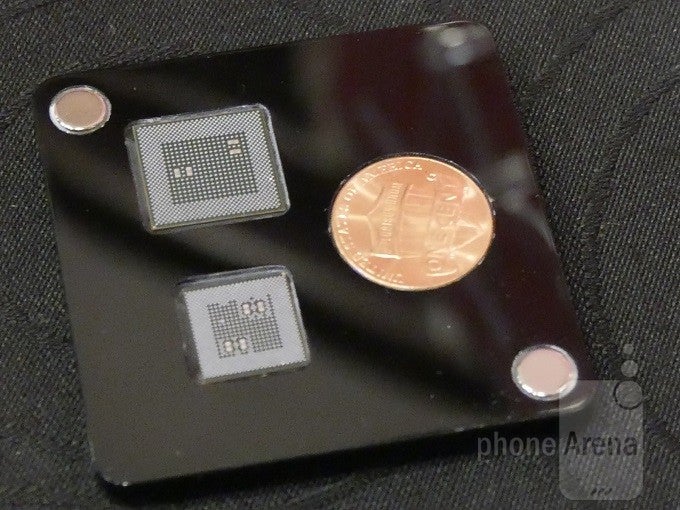 Up top, the Snapdragon 820. Below, the new Snapdragon 835, and a penny. - We get an up-close look at Qualcomm’s new 835 Snapdragon CPU