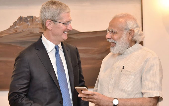 Apple CEO Tim Cook and Indian PM Narendra Modi - Apple preparing to enter talks with Indian government on opening local manufacturing plant