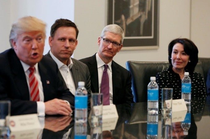 Peter Thiel sitting between the President-elect and Apple CEO Tim Cook at Donald Trump&#039;s tech summit - Silicon Valley billionaire says &quot;the age of Apple is over&quot;