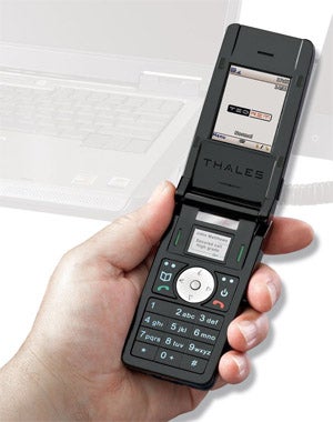 French President receiving a new encrypted phone after a BlackBerry ban