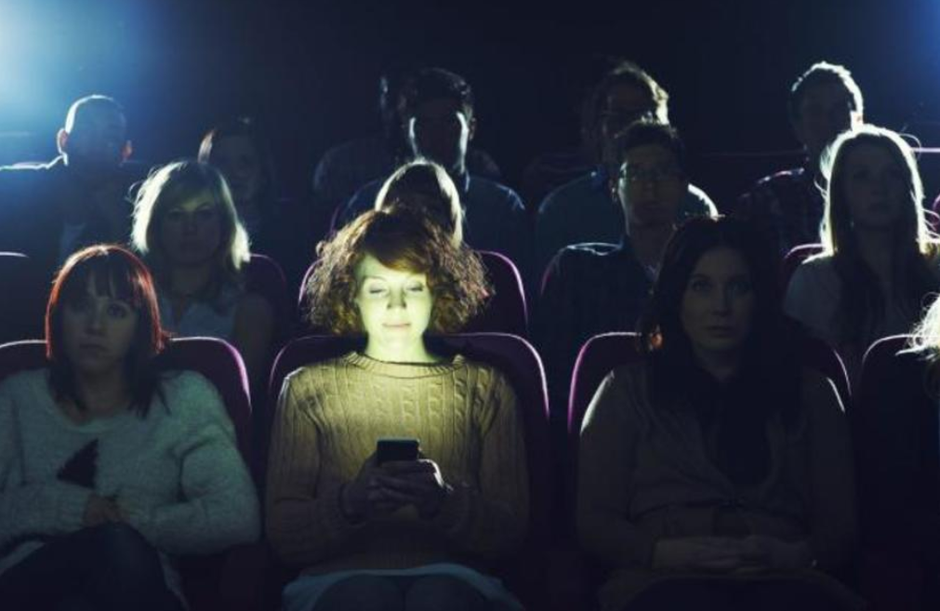The light from the screen is one of the annoyances created by someone texting during a movie - Man sues his date for texting during a movie