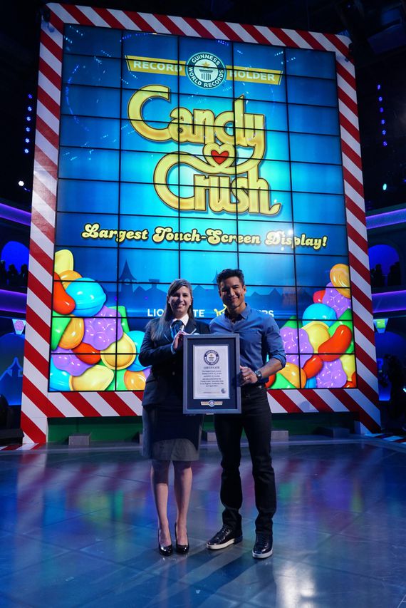 Image courtesy of CNET - The Candy Crush TV game show is a thing, and it already has a Guinness World Record