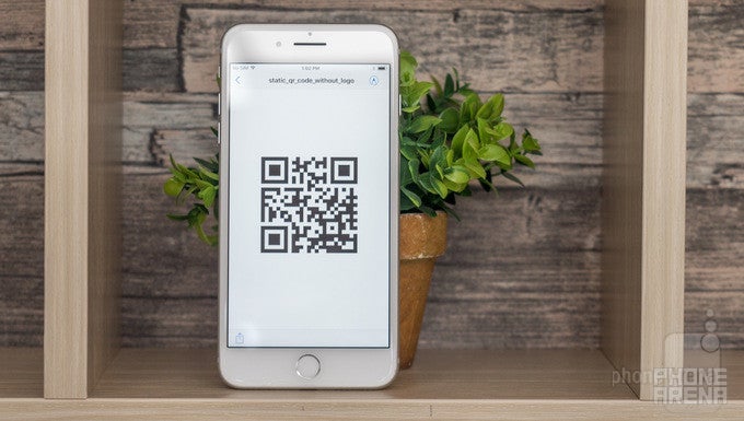 Pro tip: the iOS 11 camera app reads QR codes automatically