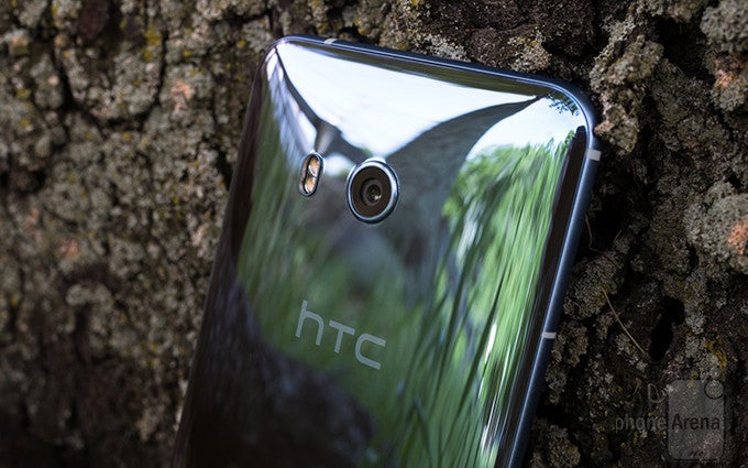 Squint hard enough and you'll see a bunch of smiling HTC executives in the phone's reflection - HTC's revenues are on the rise, and it's all thanks to the U11